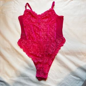 Pink lace body suit